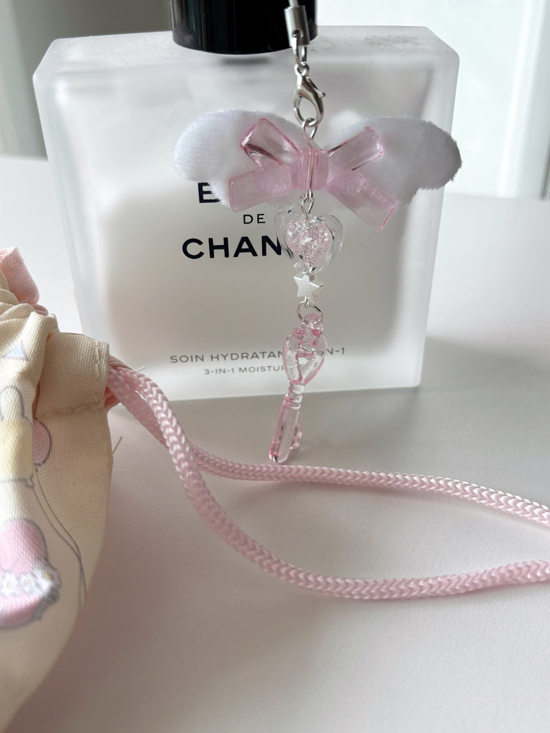 WHITE WING PINK KEY CHAIN
