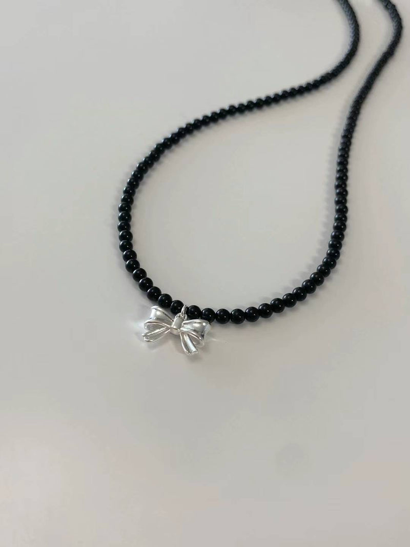 ONYX VOLUME RIBBON NECKLACE