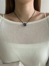 NOIR BLOSSOM NECKLACE