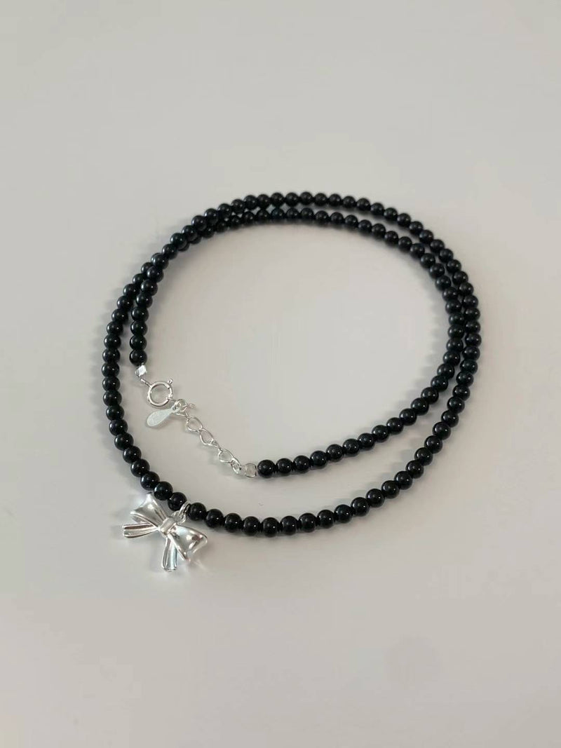 ONYX VOLUME RIBBON NECKLACE
