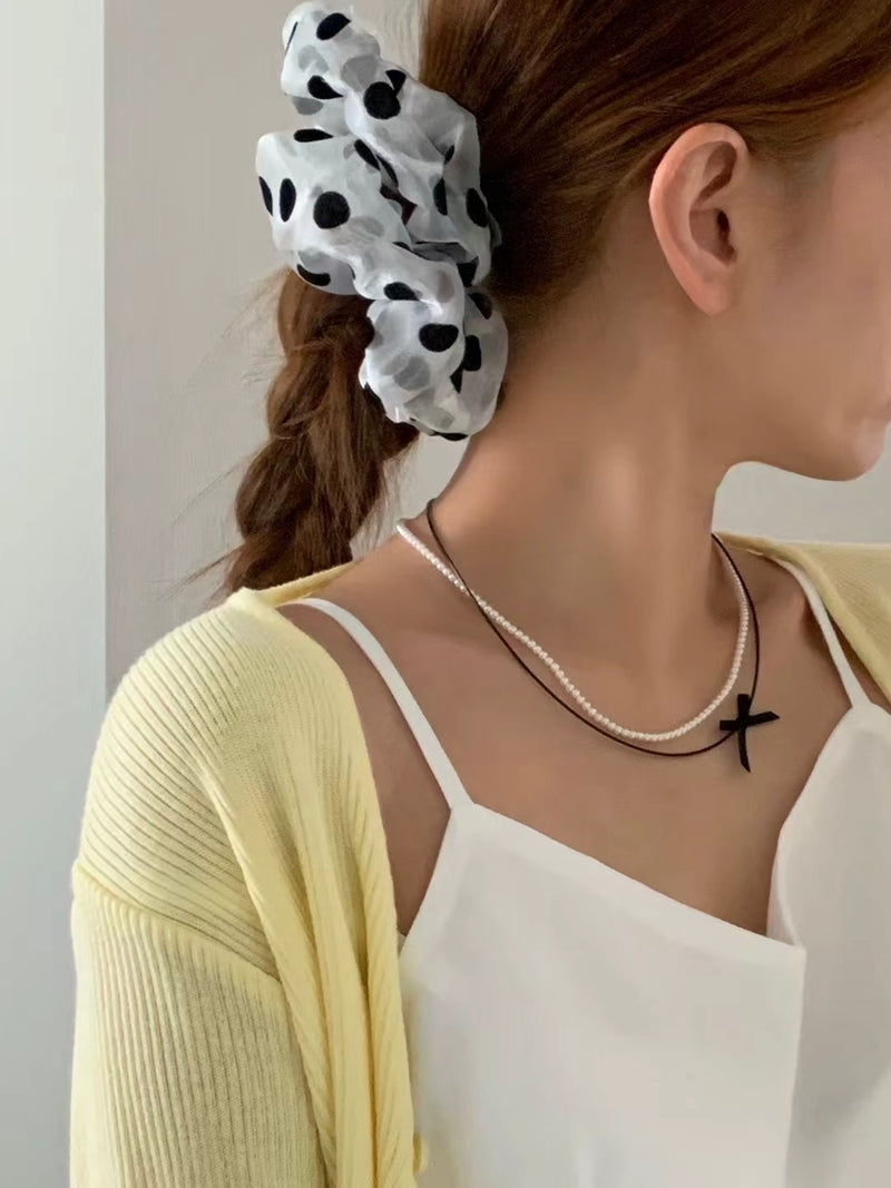 MOONLIT BOW NECKLACE