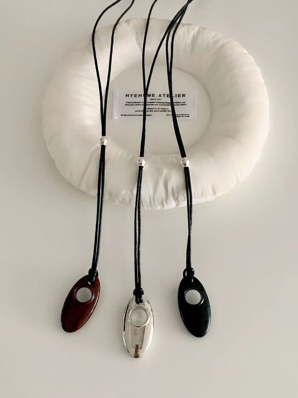 HOLLOW STONE LONG NECKLACE