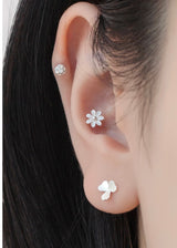Epoxy Daisy piercing